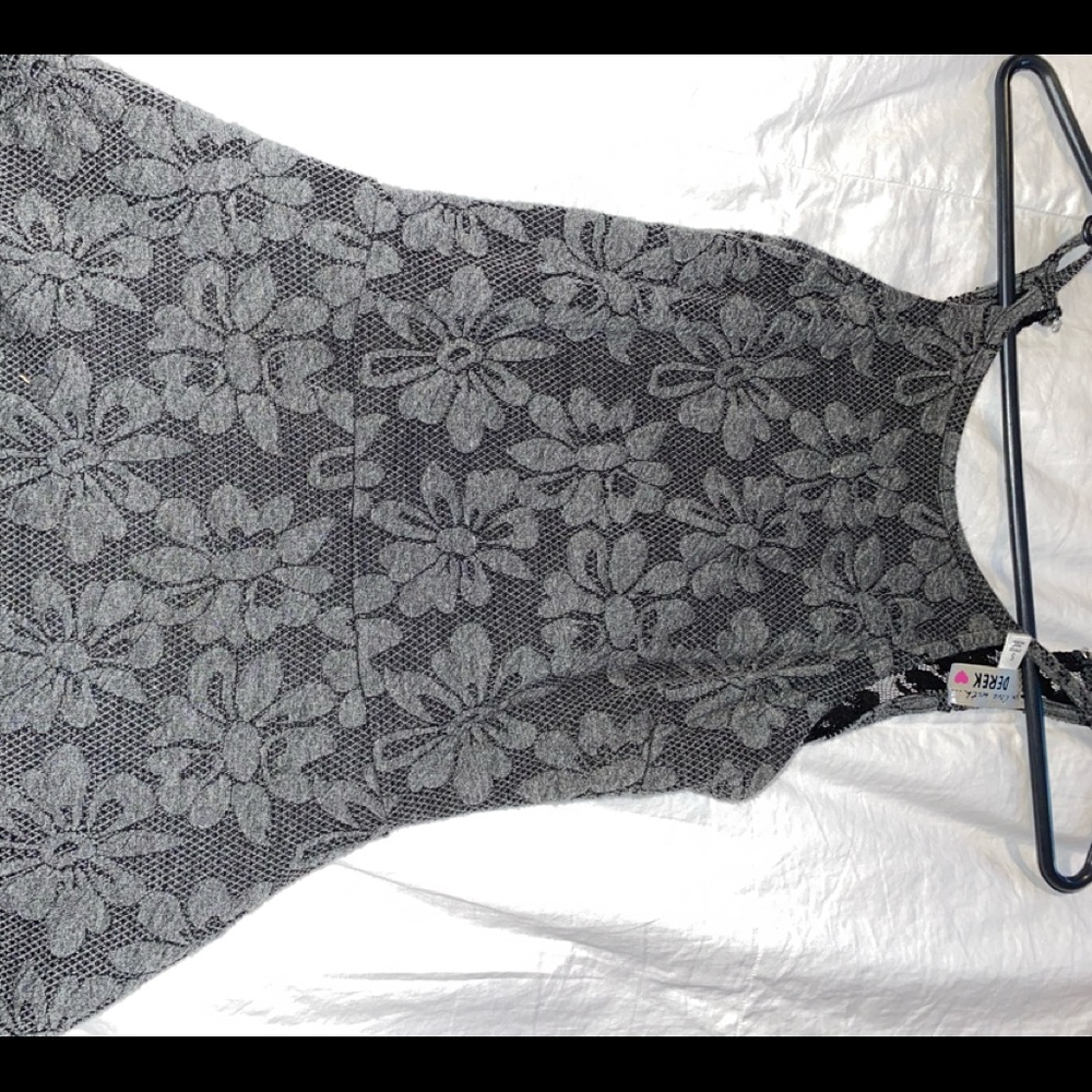 Cute gray dress with little embroidered flowers and with a laced back size small